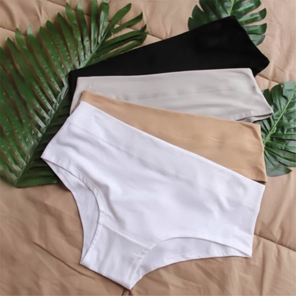 Four pairs of underwear in black, white, ,beige and gray